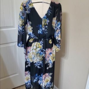Floral sheer maxi dress with black mini skirt underneath.  Large.